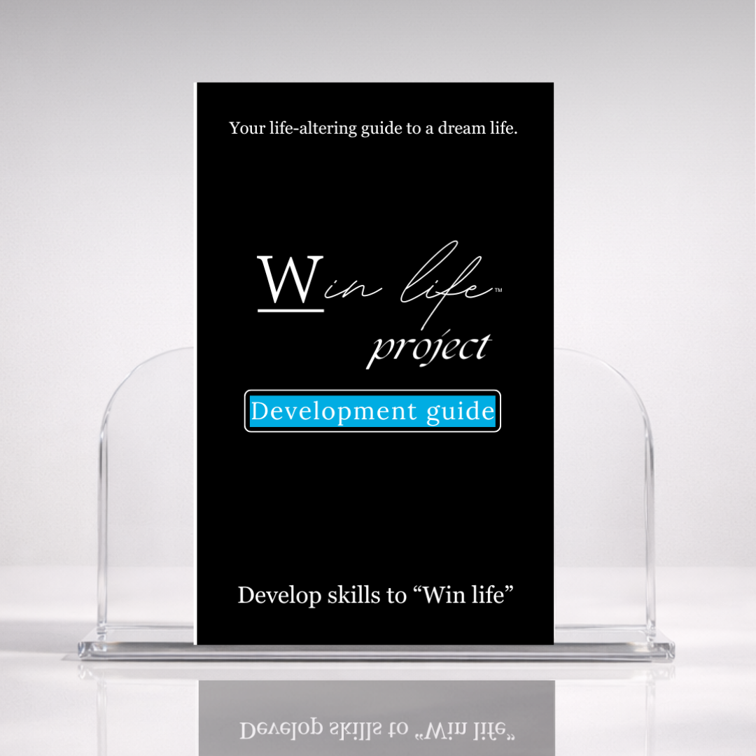 Black eBook titled 'Development Guide' from the 'Win Life Project' in a professional hero photo on a stand with a white background. A 20 page blueprint on personal and life development, for evolving into the person you want to be and also evolving your life to be what you always dreamed of.