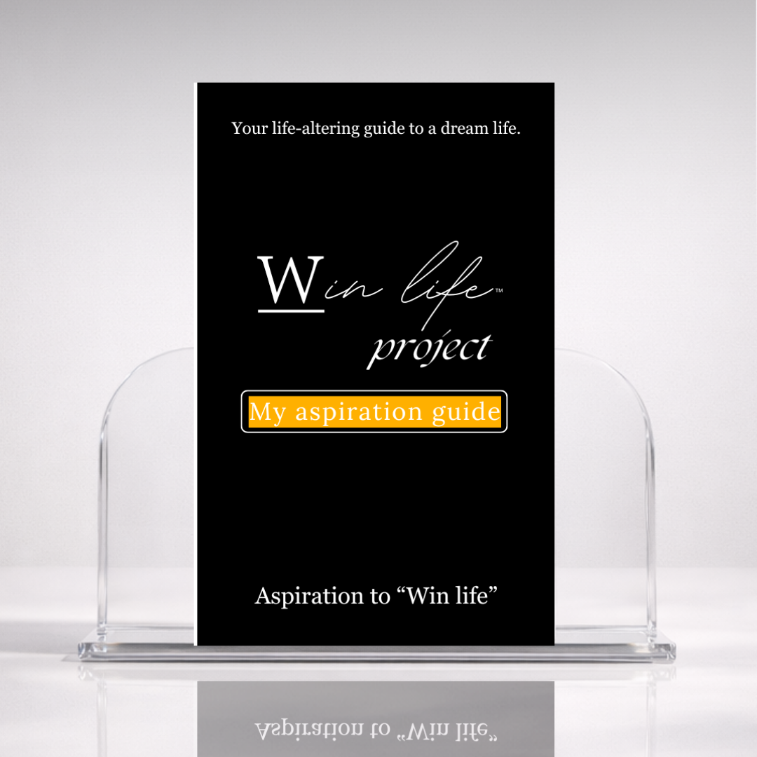 Black eBook titled 'My Aspiration Guide' from the 'Win Life Project' in a professional hero photo on a stand with a white background. A 20 page blueprint on identifying what your aspirations are in life and how to make your goals and aspirations a reality and win life.