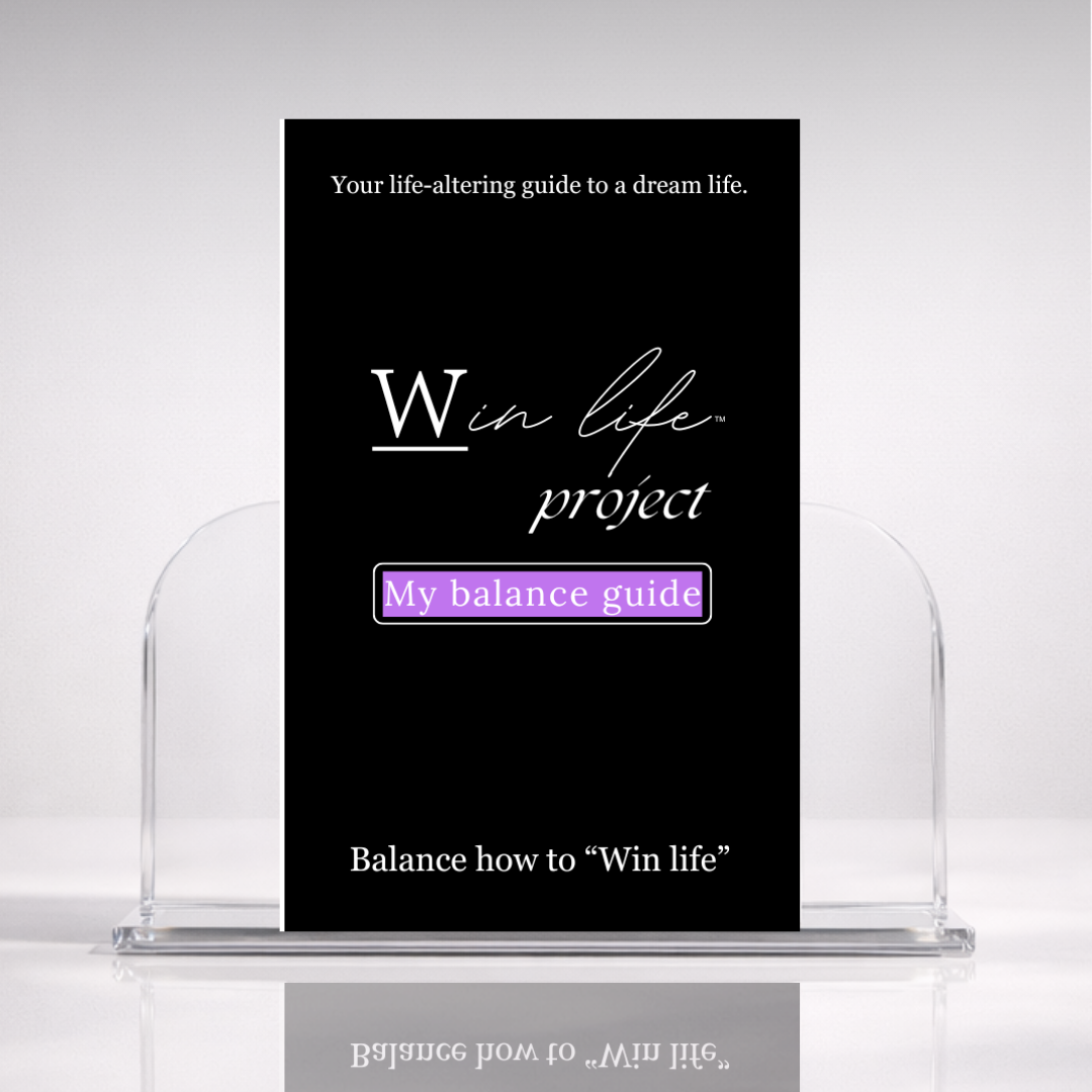 Black eBook titled 'My Balance Guide' from the 'Win Life Project' in a professional hero photo on a stand with a white background. A 20 page blueprint on finding and creating true balance in life, restoring energy and creating time, without forcing un-natural amounts of perfection throughout life.